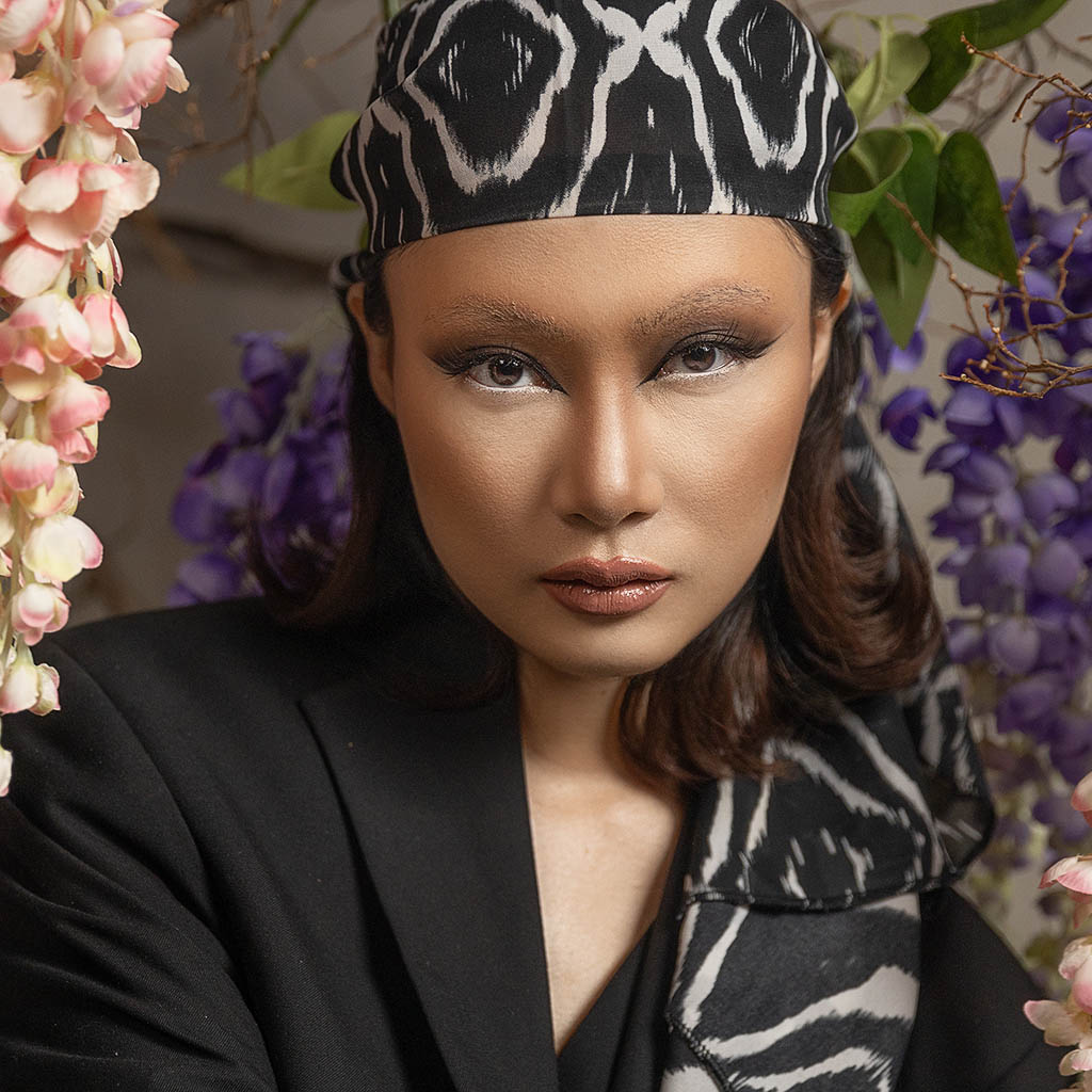 cloase up image of a young woman with bandana